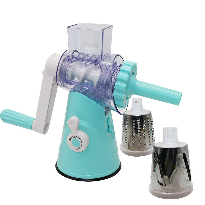 Turquoise manual rotary cheese grater with two attachments on a white background