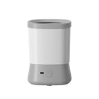 Automatic pet paw cleaner grey front view with USB charging port and paw button