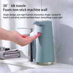 Automatic touchless foam soap dispenser in a bathroom sink setting